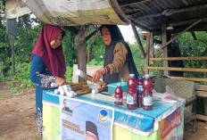 Makan Lemang yang Enak Itu Pakai Ini